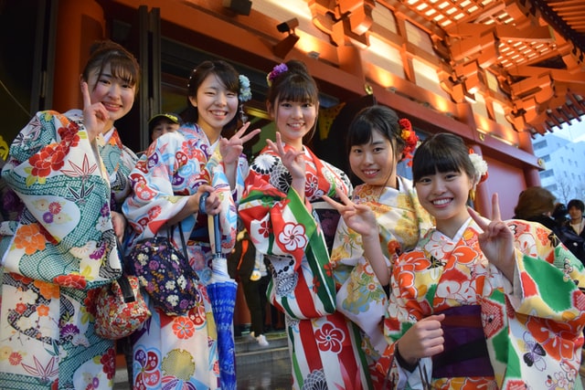 Japanese women in kimonos.