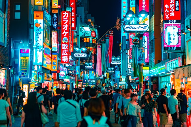 People on the street in a city in Japan.